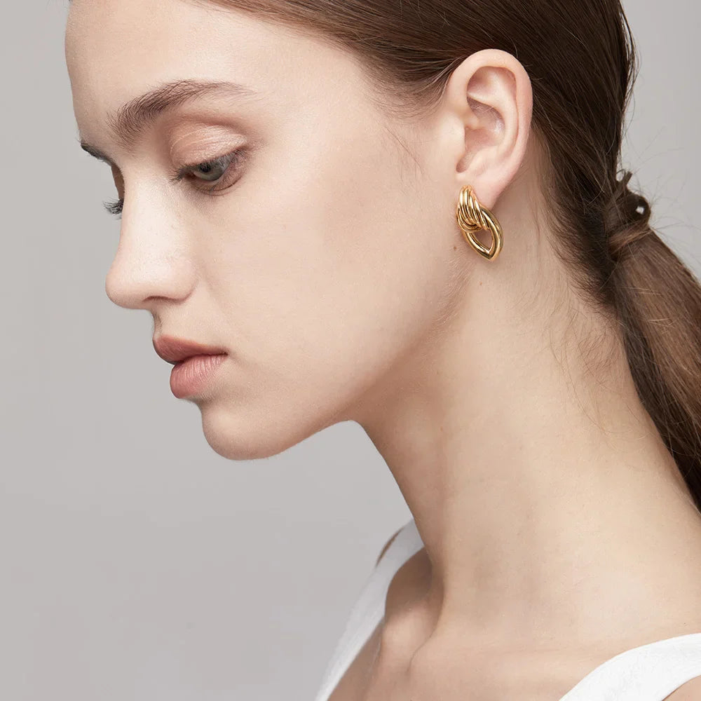 Hollow Water Stud Earrings Golden - Magada Store 